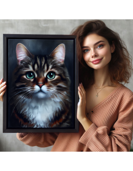 cat painting in a black frame displayed by a lady