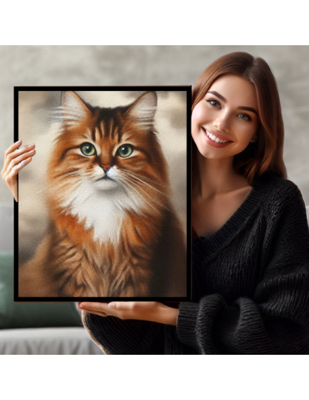 lady displaying her custom cat portrait painting from Snappy Canvas in a frame